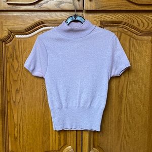 Trigoly moc turtle short sleeve fitted top. Stretchy 100% nylon. Size small